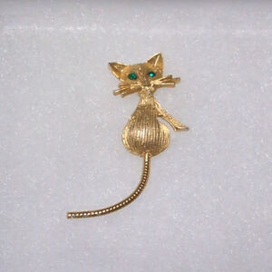 Gold Tone Mouse pin/brooch, with Rhinestone Eyes.
